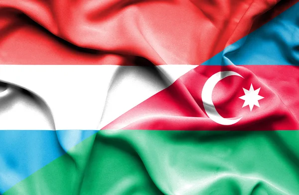 Waving flag of Azerbajan and Luxembourg — Stock Photo, Image