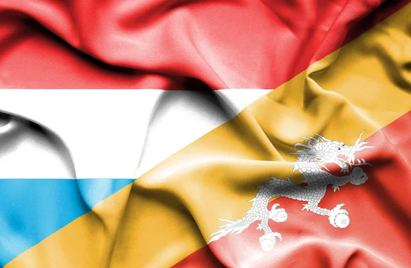 Viftande flagga Bhutan och Luxemburg — Stockfoto
