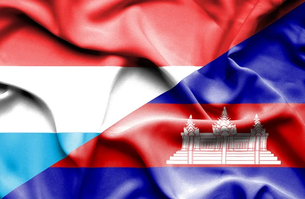 Waving flag of Cambodia and Luxembourg — Stock Photo, Image