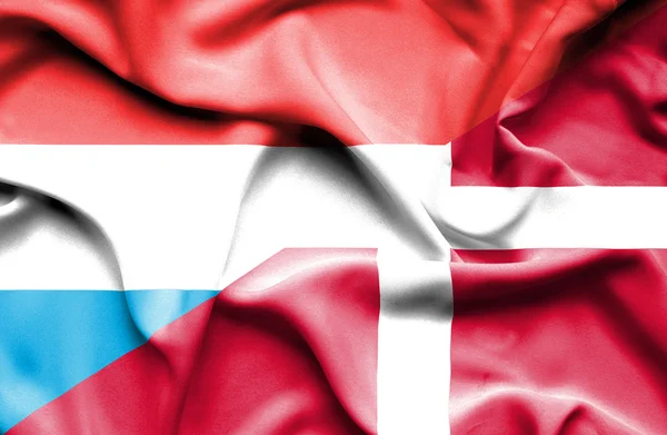 Waving flag of Denmark and Luxembourg — Stock Photo, Image