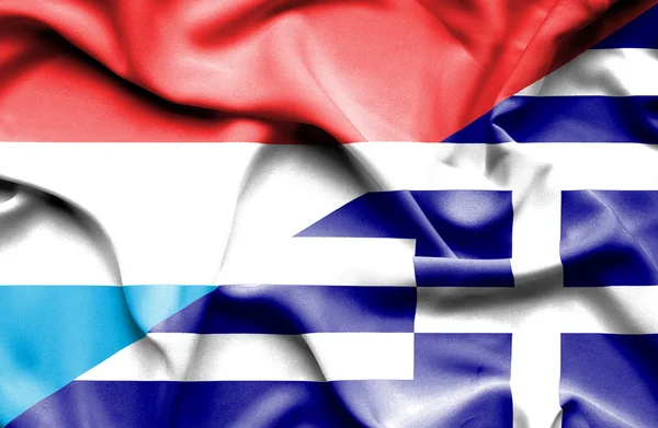 Waving flag of Greece and Luxembourg — Stock Photo, Image