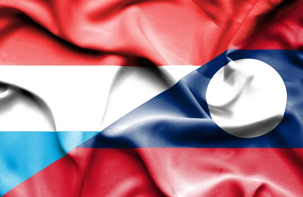 Bandeira acenando de Laos e Luxemburgo — Fotografia de Stock