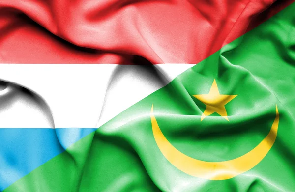 Waving flag of Mauritania and Luxembourg — Stock Photo, Image