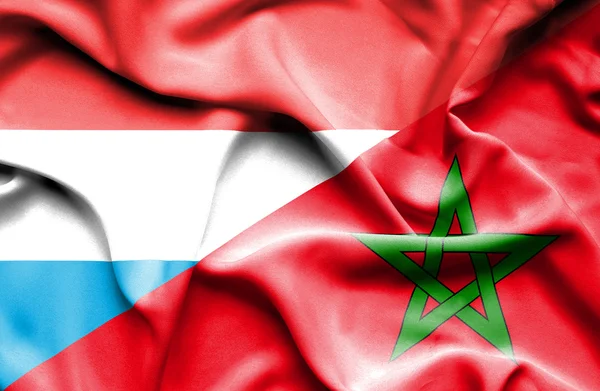 Bandera ondeante de Marruecos y Luxemburgo — Foto de Stock