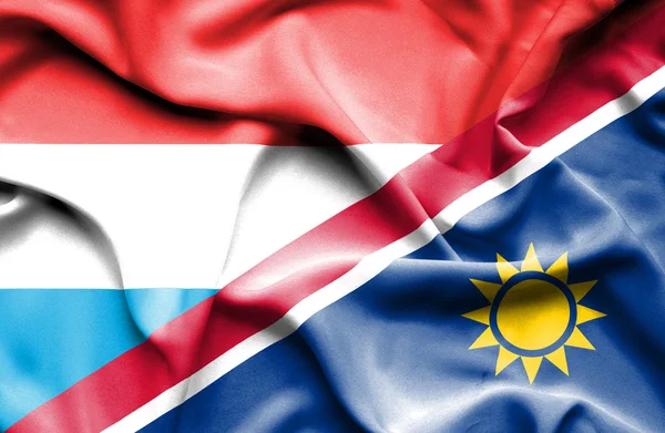 Wapperende vlag van Namibië en Luxemburg — Stockfoto