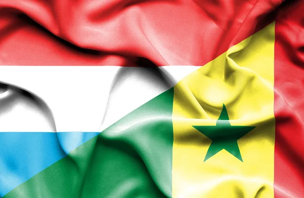 Wapperende vlag van Senegal en Luxemburg — Stockfoto