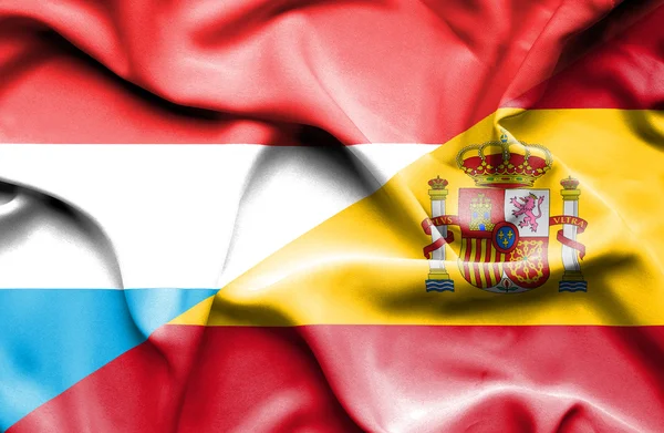 Waving flag of Spain and Luxembourg — Stock Photo, Image