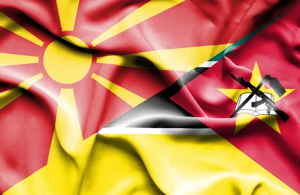 Mozambik és Macedónia hullámzó zászlaja — Stock Fotó