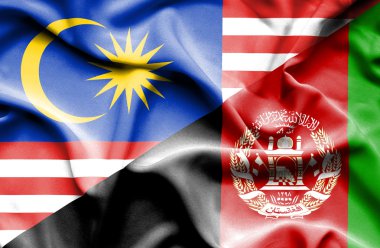 Afganistan ve Malezya bayrağı sallayarak