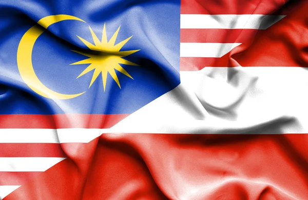 Waving flag of Austria and Malaysia — Stock Photo, Image