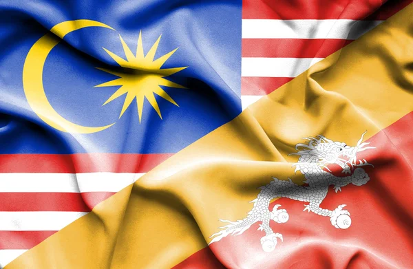 Machać flaga Bhutanu i Malezji — Zdjęcie stockowe