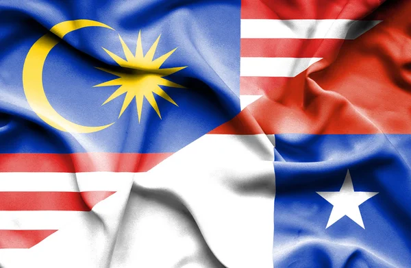 Waving flag of Chile and Malaysia — Stock Photo, Image