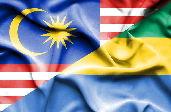 Bandiera sventolante di Gabon e Malesia — Foto Stock