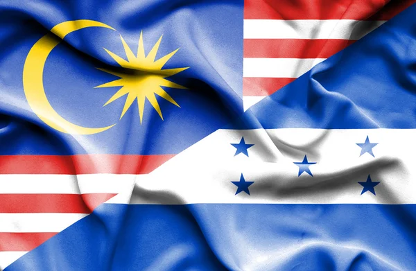 Viftande flagga Honduras och Malaysia — Stockfoto