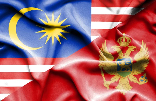 Waving flag of Montenegro and Malaysia — Stock Photo, Image