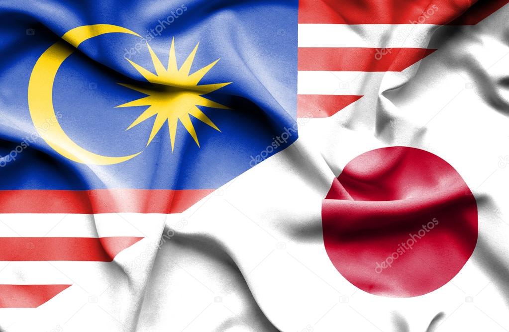 Waving flag of Japan and Malaysia