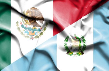 Guatemala ve Meksika bayrağı sallayarak