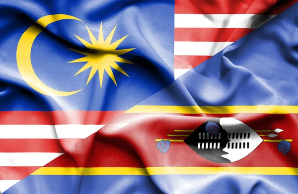 Waving flag of Swazliand and Malaysia — Stock Photo, Image