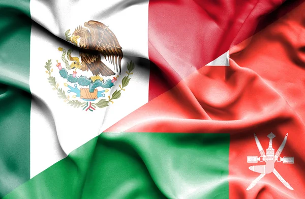 Bandeira acenando de Omã e México — Fotografia de Stock