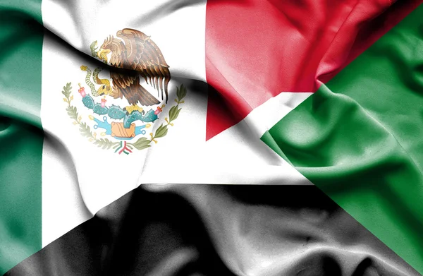 苏丹和墨西哥那飘扬的旗帜 — 图库照片