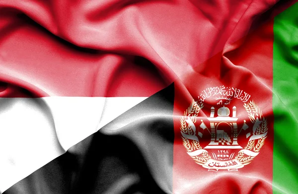 Vlající vlajka Afghánistánu andmonaco — Stock fotografie