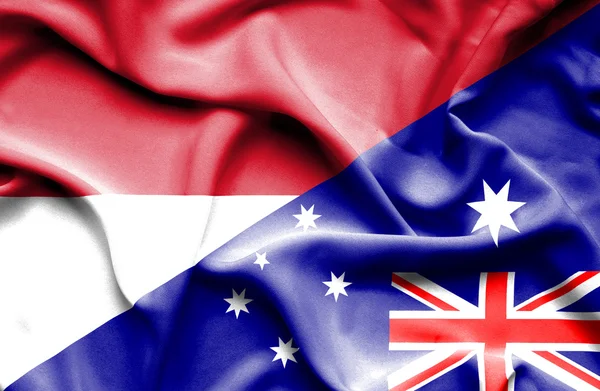 Waving flag of Australia and Monaco — Stock Photo, Image