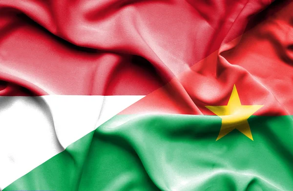 Bandeira acenando de Burkina Faso e Monaco — Fotografia de Stock