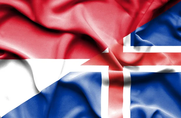 Flagge von Island und Monaco schwenken — Stockfoto