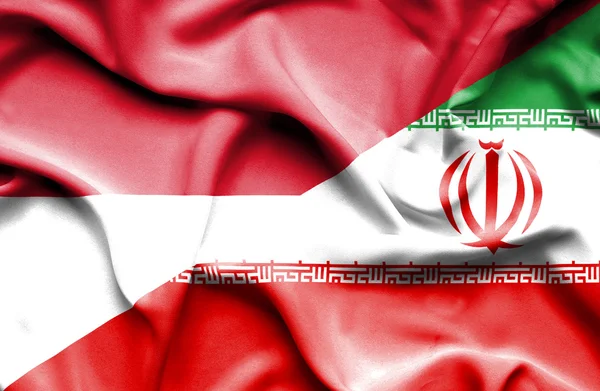 Wapperende vlag van Iran en Monaco — Stockfoto