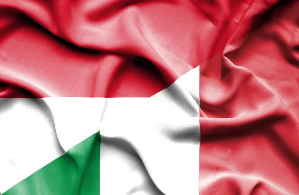 Waving flag of Italy and Monaco — Stock Photo, Image