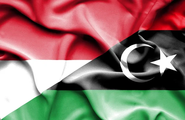 Vlající vlajka Libye a Monako — Stock fotografie