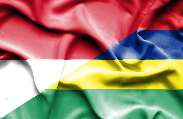 Flagge von Mauritius und Monaco schwenkend — Stockfoto