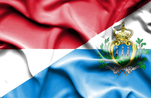 Waving flag of San Marino and Monaco — Stock Photo, Image