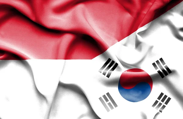 Waving flag of South Korea and Monaco — Stock Photo, Image