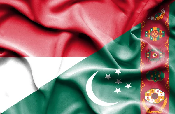 Розмахуючи прапором Туркменістану та Монако — стокове фото