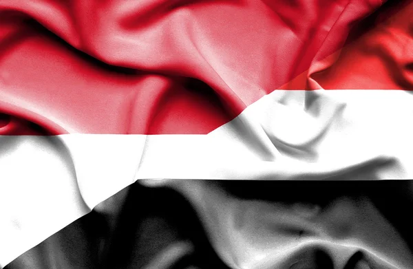 Ondeando la bandera de Yemen y Mónaco — Foto de Stock