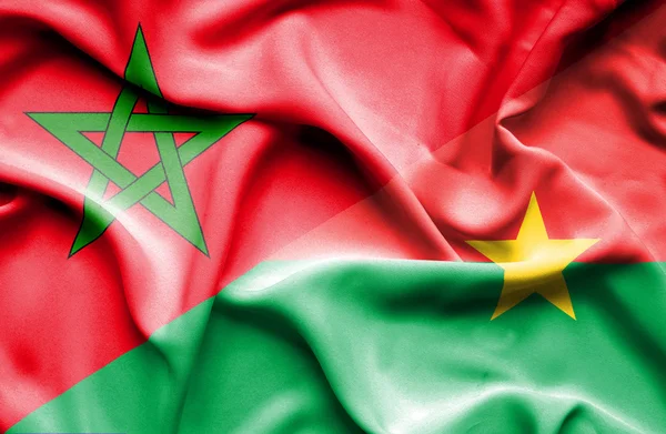 Flagge von Burkina Faso und Marokko schwenken — Stockfoto