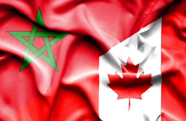 Wapperende vlag van Canada en Marokko — Stockfoto