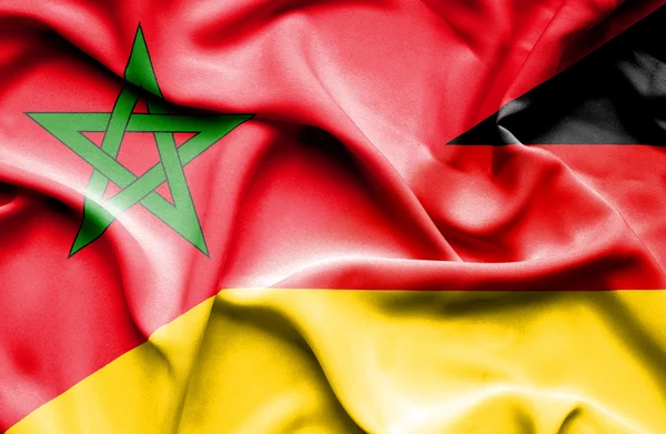 Wapperende vlag van Duitsland en Marokko — Stockfoto