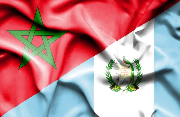 Waving flag of Guatemala and Morocco — Stock Photo, Image