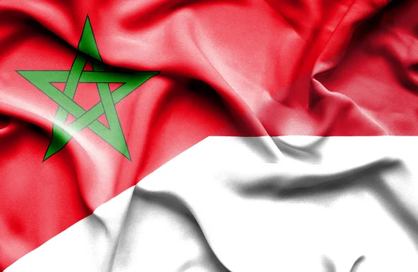 Wapperende vlag van Monaco en Marokko — Stockfoto