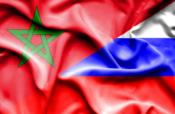 Ondeando la bandera de Rusia y Marruecos — Foto de Stock