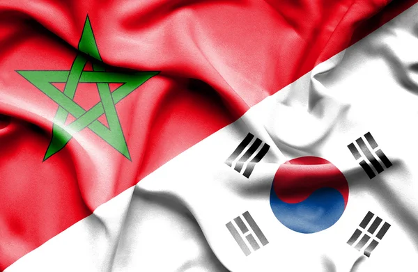 Vlající vlajka Jižní Koreje a Maroko — Stock fotografie