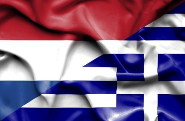 Yunanistan ve Hollanda bayrağı sallayarak