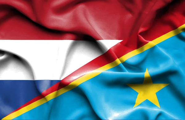 Waving flag of Congo Democratic Republic and Netherlands — Stock Photo, Image