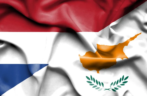 Wapperende vlag van cyprus en Nederland — Stockfoto