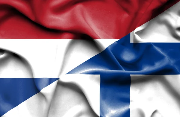 Flagge Finnlands und der Niederlande schwenken — Stockfoto