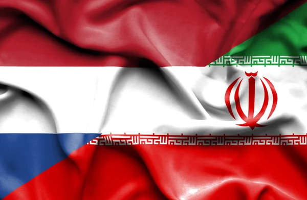 Bandera ondeante de Irán y Países Bajos — Foto de Stock