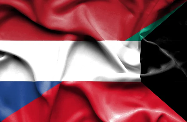 Mávání vlajkou Kuvajtu a Nizozemsko — Stock fotografie