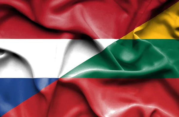 Waving flag of Lithuania and Netherlands — Stock Photo, Image